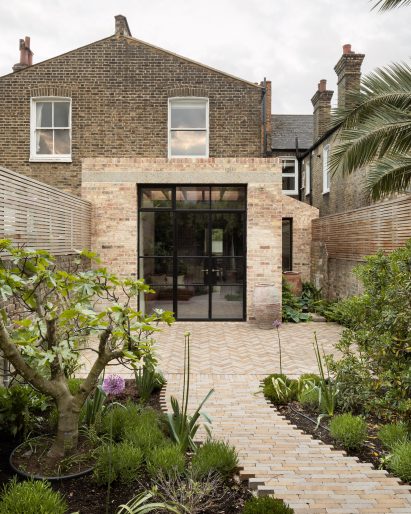 Rear facade of Pink House by Oliver Leech Architects