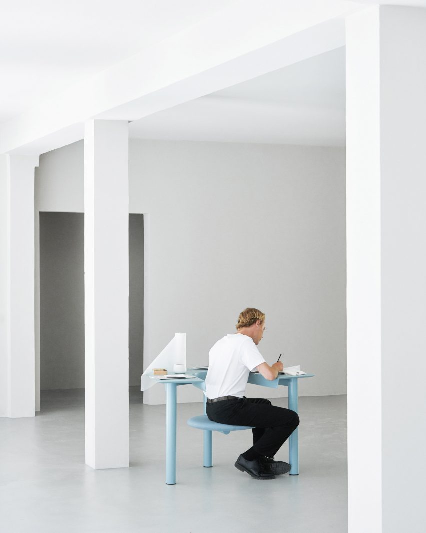 Light blue Sui Desk Chair used as a desk