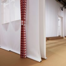 Interior image of the Prada Spring Summer 2023 menswear show space by AMO
