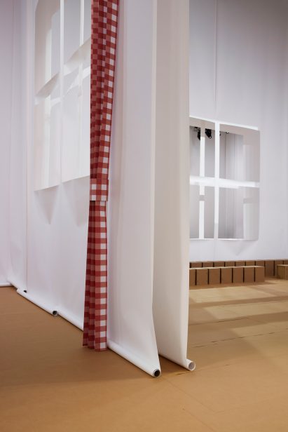 Rolls of paper were used as walls at the Prada Spring Summer 2023 menswear show