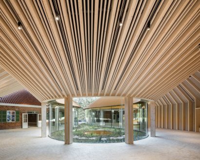 Glass and timber curved extension building