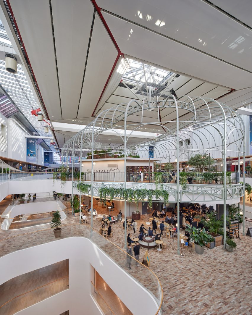 Parc. 1 is a mixed-used building that was created by Rogers Stirk Harbour + Partners