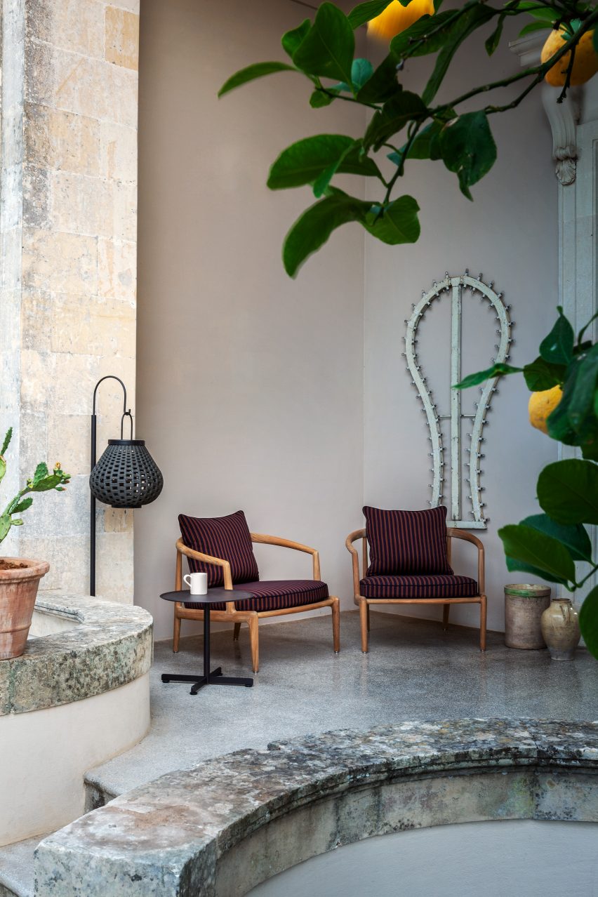 Two outdoor armchairs by Poltrona Frau