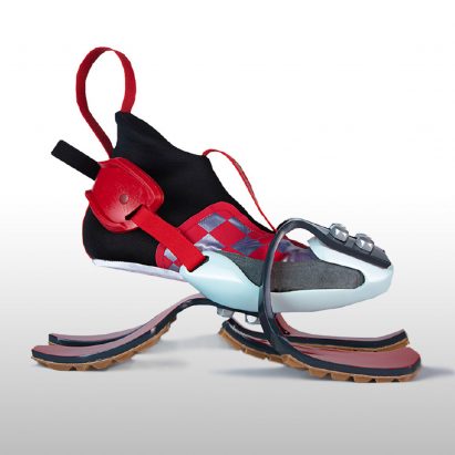 A black and red shoe design with separated sole