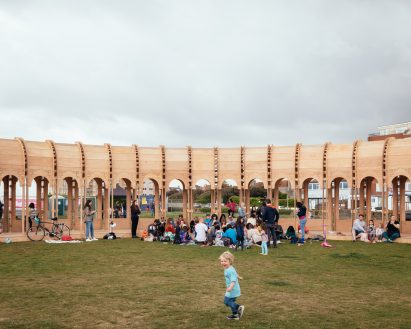 People gathering at The Riwaq at Brighton Festival