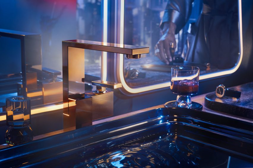 Axor Edge faucet in polished gold optic finish in dark Tristan Auer-designed bathroom