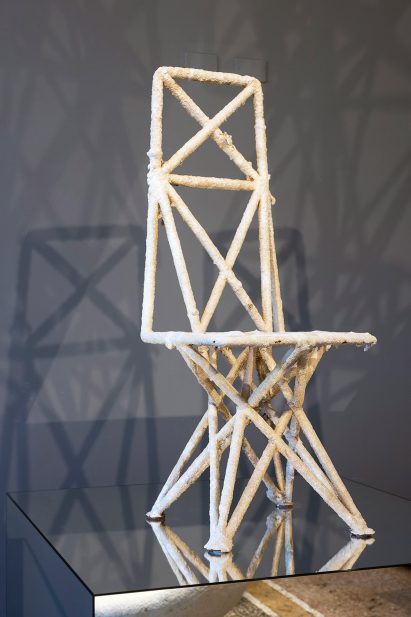 Accretion is a chair that has been fished out of the ocean