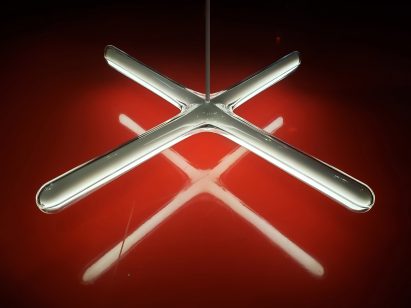 A photograph of Lithium light against a red background