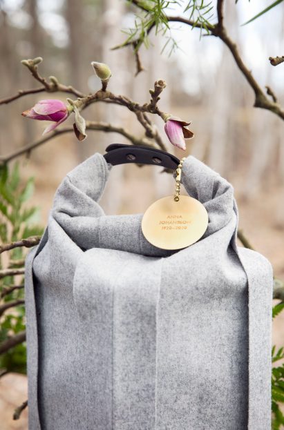 Close-up of a name tag on a woolen burial urn designed by Claesson Koivisto Rune