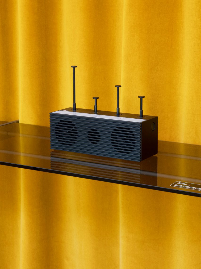 A rectangular music player with four aerials