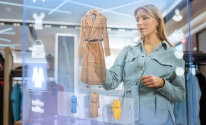 A picture of a person looking at fashion designs