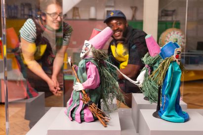 A photograph of theatrical models made from paper and fabric