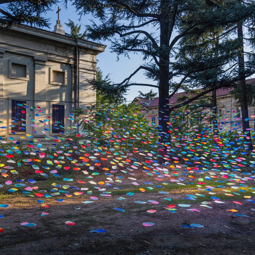 Photograph showing exterior of building with colourful patches
