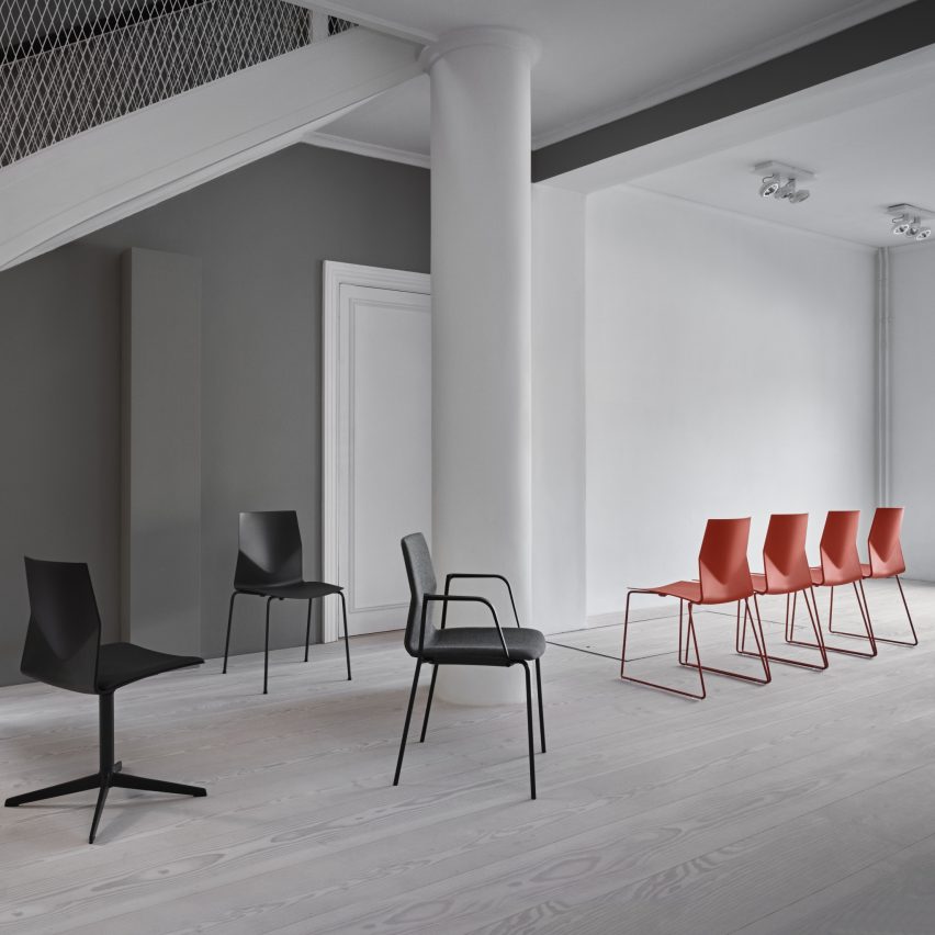 Photograph showing an office interior with various chairs