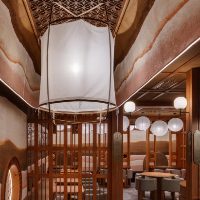 Photograph showing an interior with large white lantern