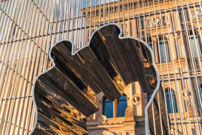 Cut-out of two figures in Arch by Ai Weiwei