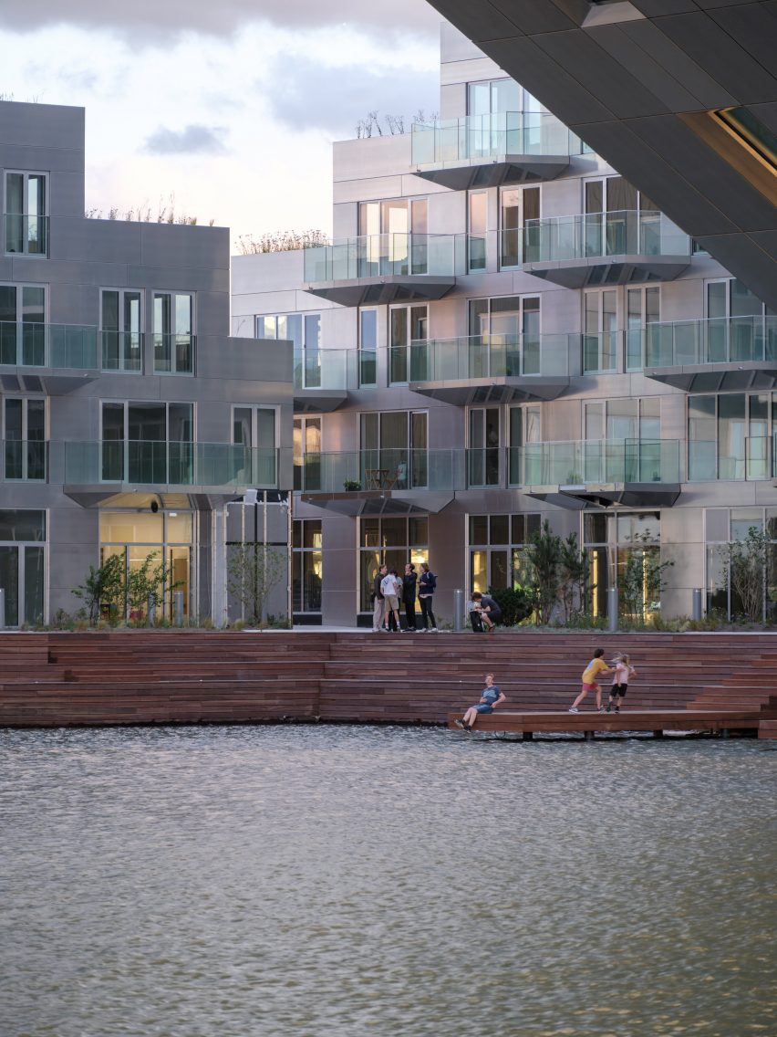 Sluishuis housing block by BIG and Barcode Architects cantilevered over IJ lake