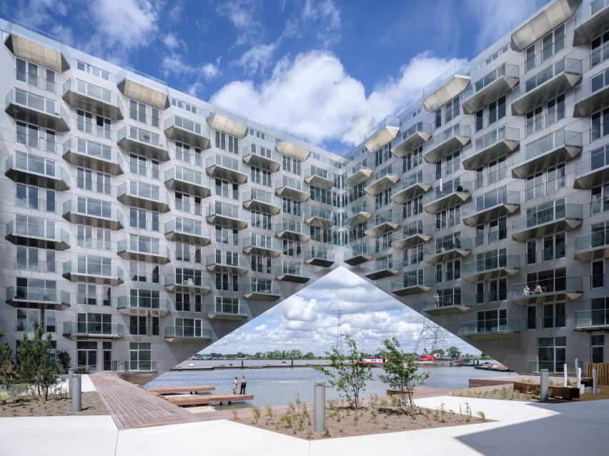 Sluishuis housing block by BIG and Barcode Architects cantilevered over IJ lake