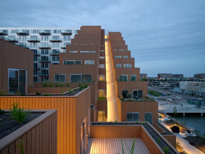 Sluishuis housing block by BIG and Barcode Architects cantilevered over IJ lake