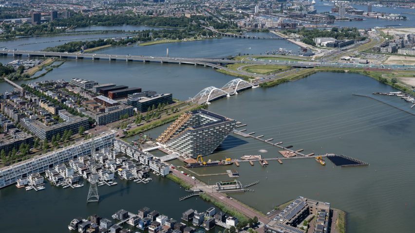 Sluishuis housing block by BIG and Barcode Architects cantilevered over IJ lake
