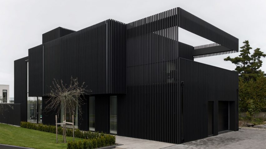 Villa Hovås is clad in blackened timber slats
