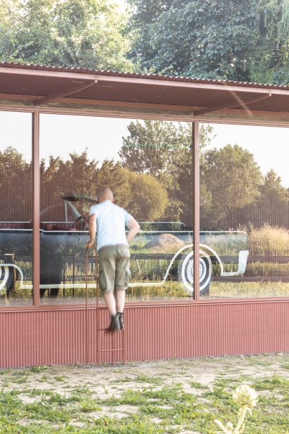 Person viewing car inside Lincoln Pavilion