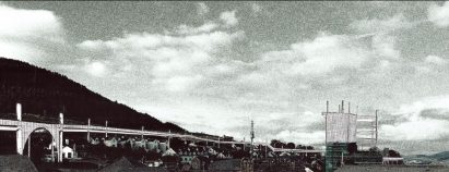 Stylised grainy render of a sprawling bridge-like structure on a hillside
