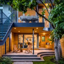 Townhouse extension around a magnolia tree