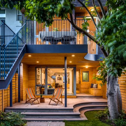 Townhouse extension around a magnolia tree