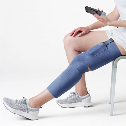 Person wearing blue Cionic Neural Sleeve on their leg