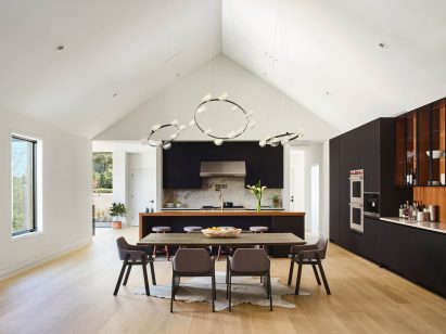 Gabled living room with circular lights