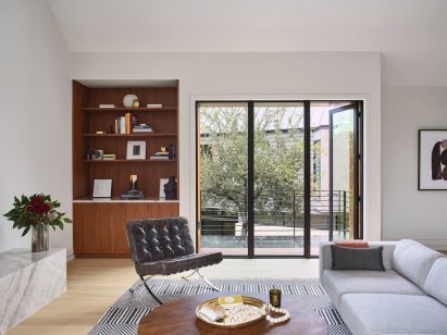 Clayton Korte inset bookcase white walls
