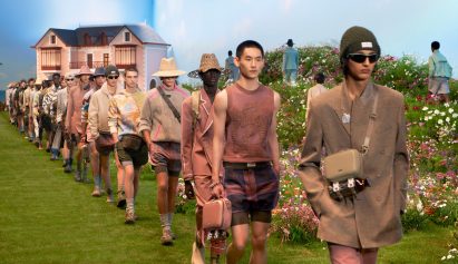 Image of models walking the grassy runway at Dior