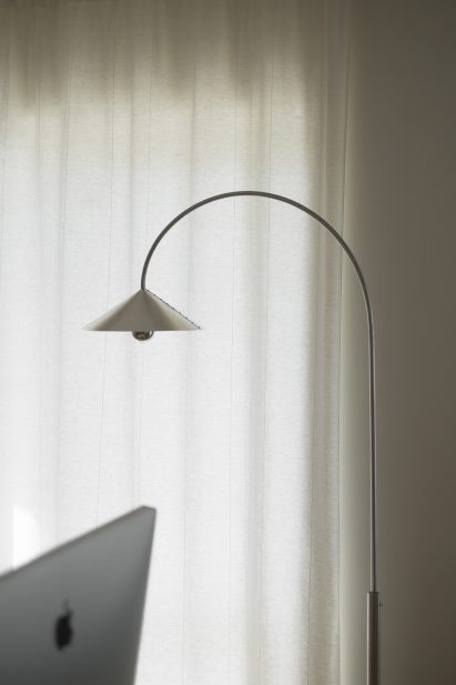Metal floor lamp made from scooter parts