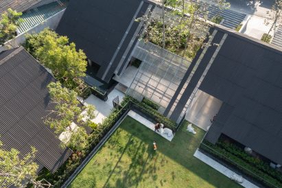 Home combined with dog hotel by EKAR Architects