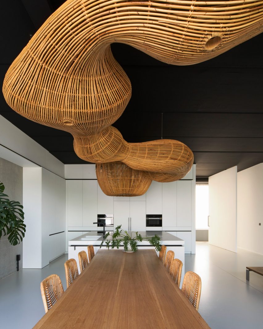 Office with rattan ceiling sculpture