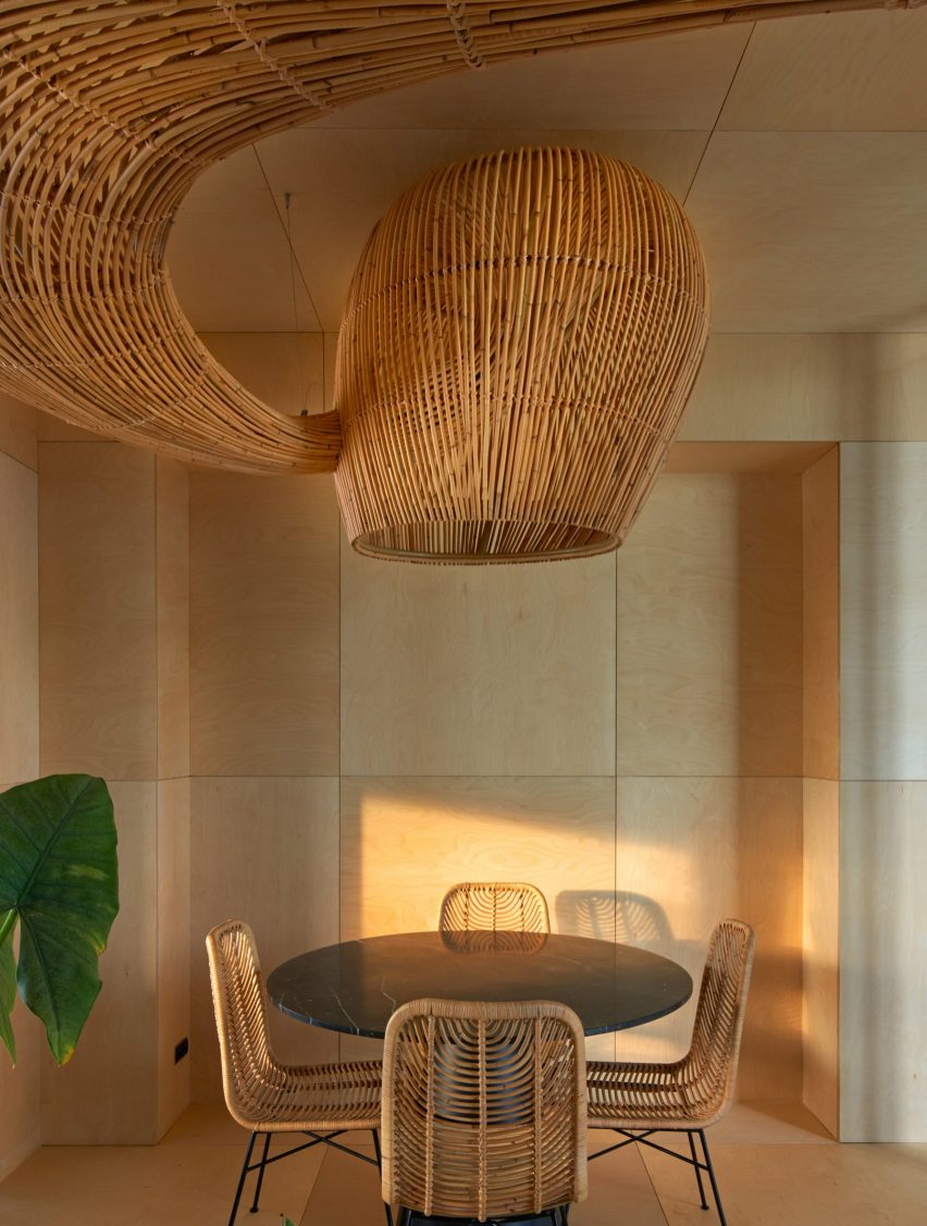 Belgium office with rattan sculpture by Enter Projects Asia