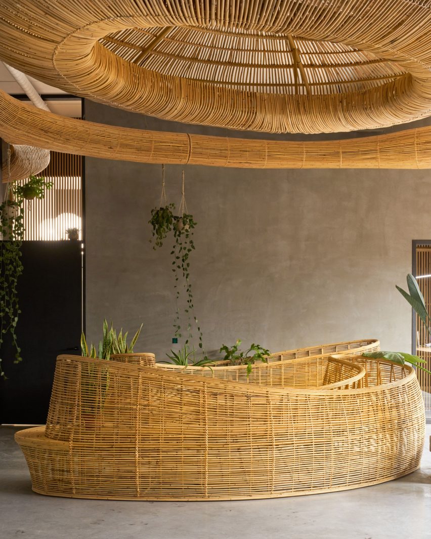 Belgium office with rattan sculpture by Enter Projects Asia