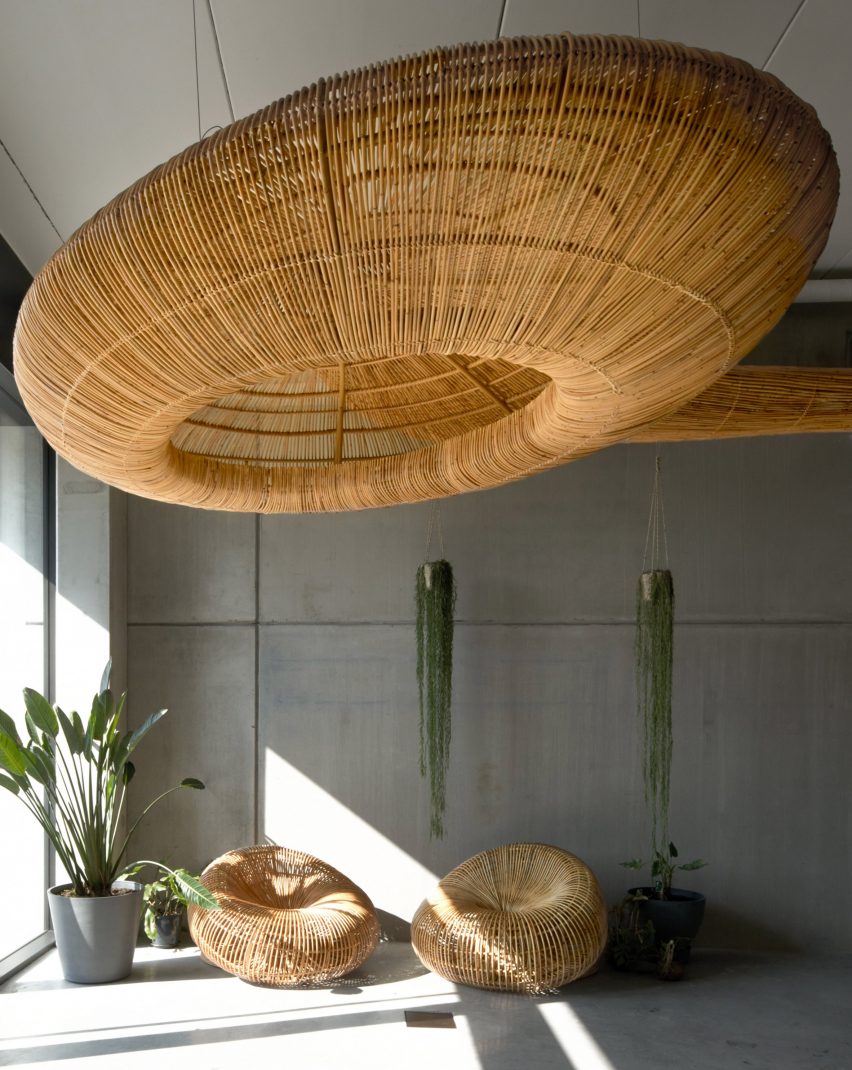 Belgium office with rattan sculpture by Enter Projects Asia