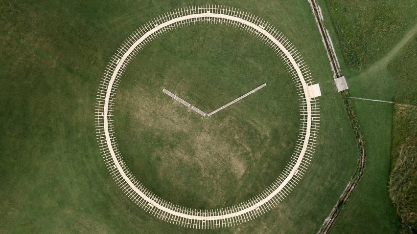 A birdseye view of a clock-shaped installation