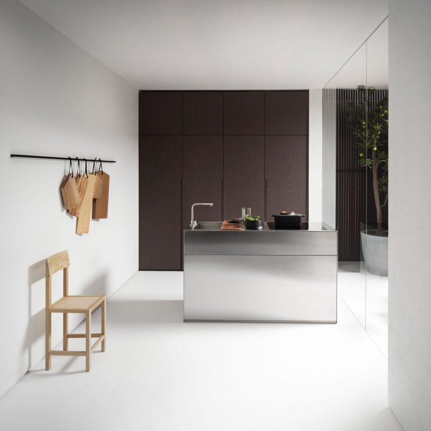 Falper tall units and kitchen island in a light white kitchen space