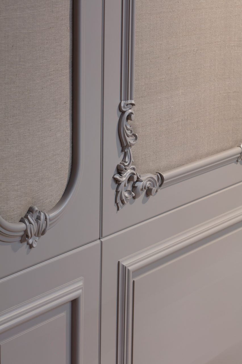 Close-up of hand-carved borders on wall panelling by L'Ottocento