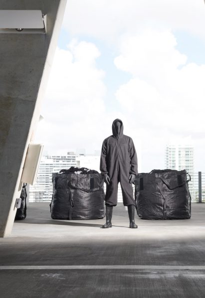 Image of a person wearing Yeezy Gap engineered by Balenciaga at Herzog & de Meuron's 1111 Lincoln Road