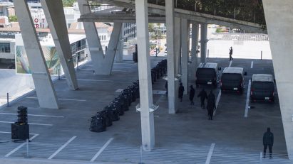 Image of waste bins filled with Yeezy Gap engineered by Balenciaga at Herzog & de Meuron's 1111 Lincoln Road