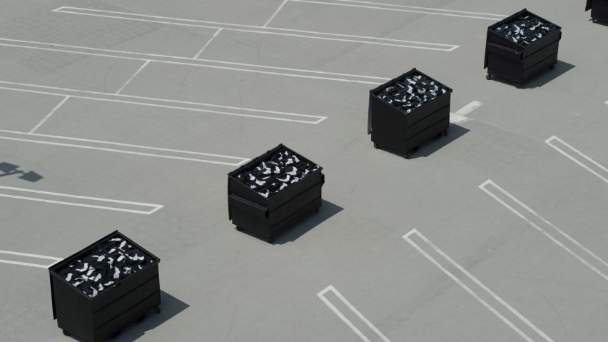 Image of waste bins filled with Yeezy Gap engineered by Balenciaga