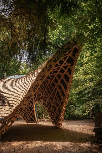 Timber shelter at Westonbirt arboretum by Invisible Studio