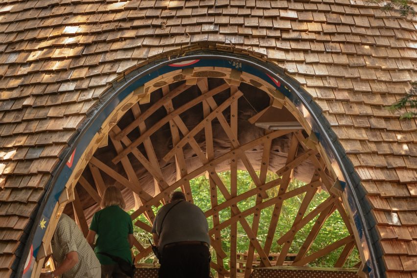 Timber shelter at Westonbirt arboretum by Invisible Studio 