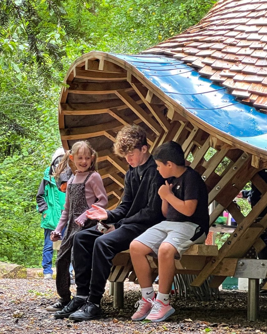 Timber shelter at Westonbirt arboretum by Invisible Studio 