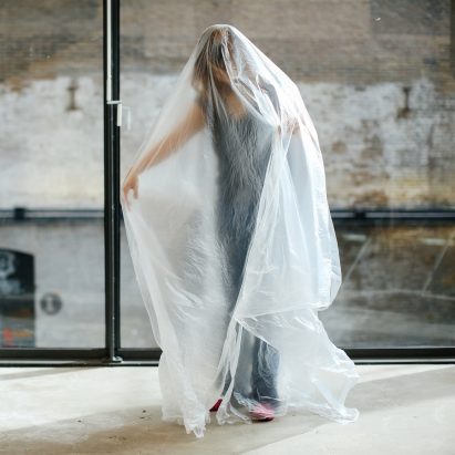 MA Performance Design and Practice Central Saint Martins student under a transparent fabric