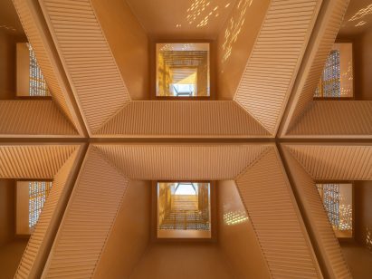 Skylights in forest-shaped perforated aluminium canopy